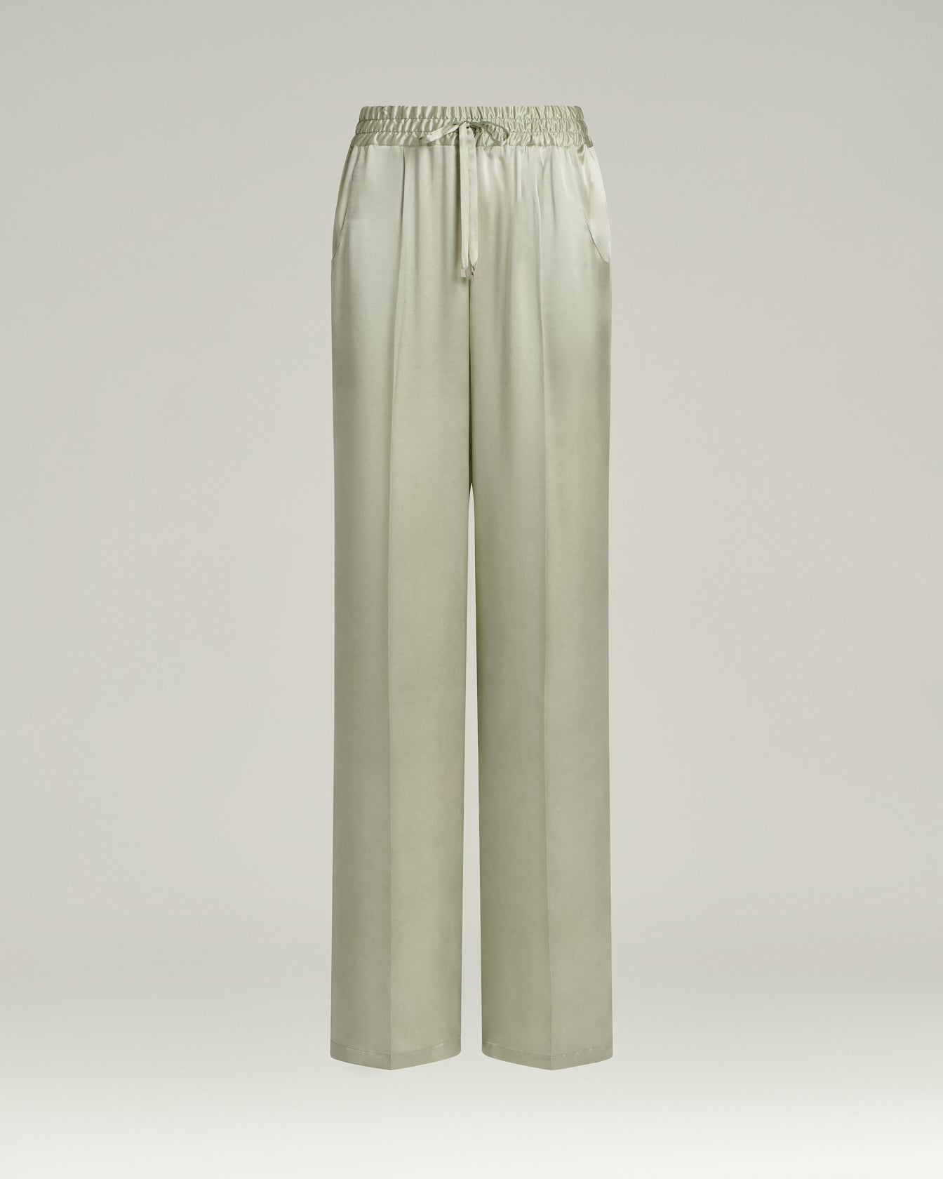 Women's fluid silk satin trousers in green | Kiton