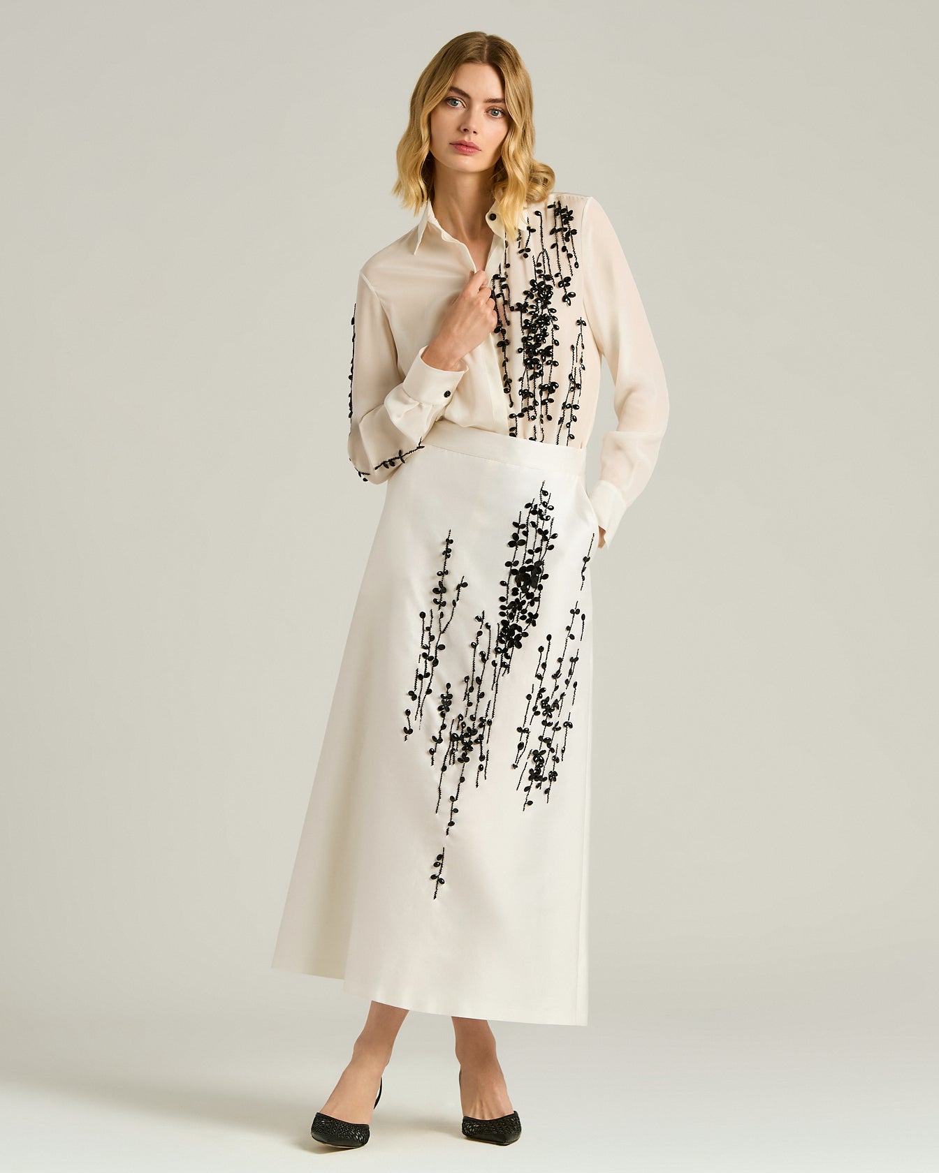 TAILORED SKIRT WITH RAISED EMBROIDERY