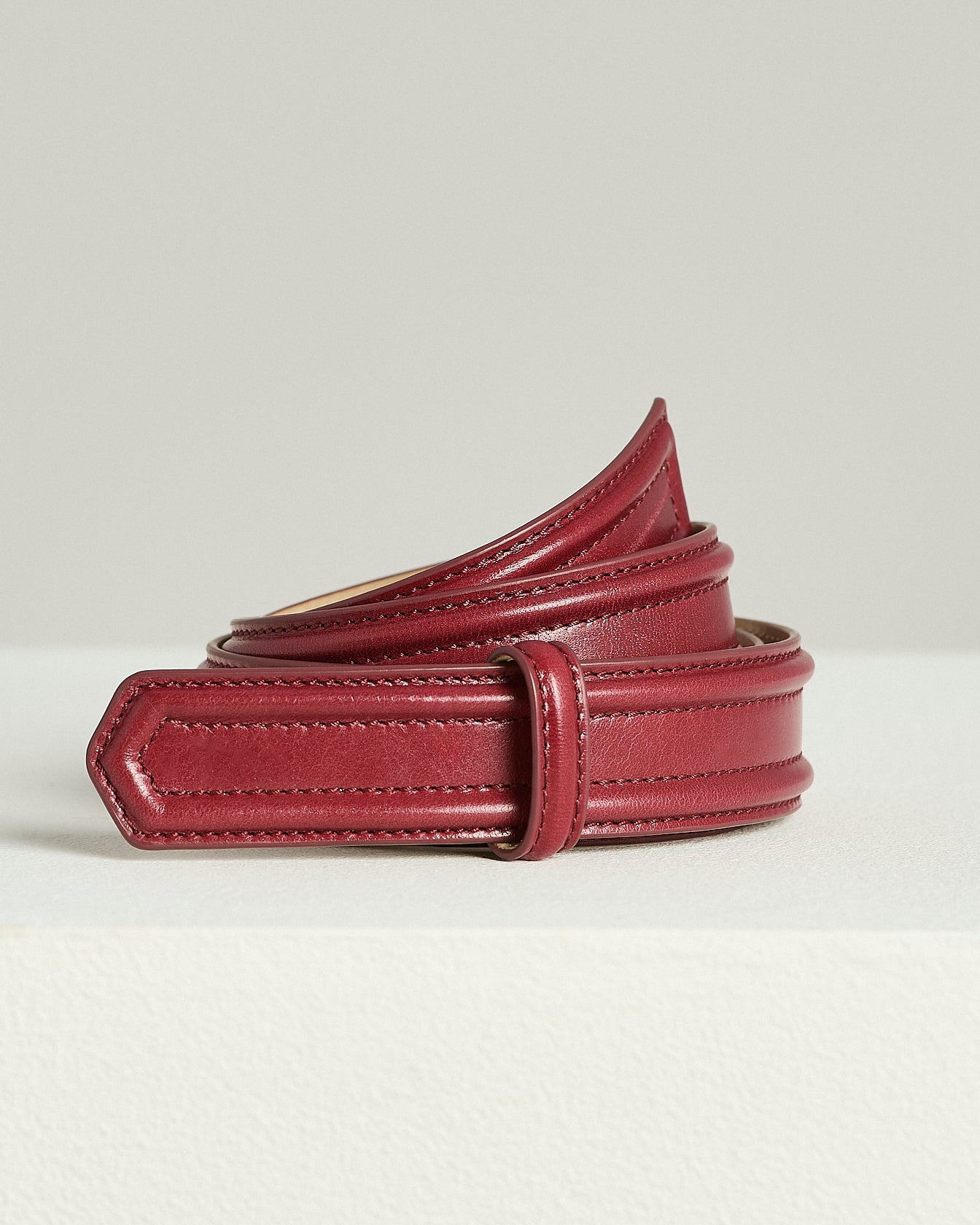 LEATHER BELT WITH PADDED EDGES