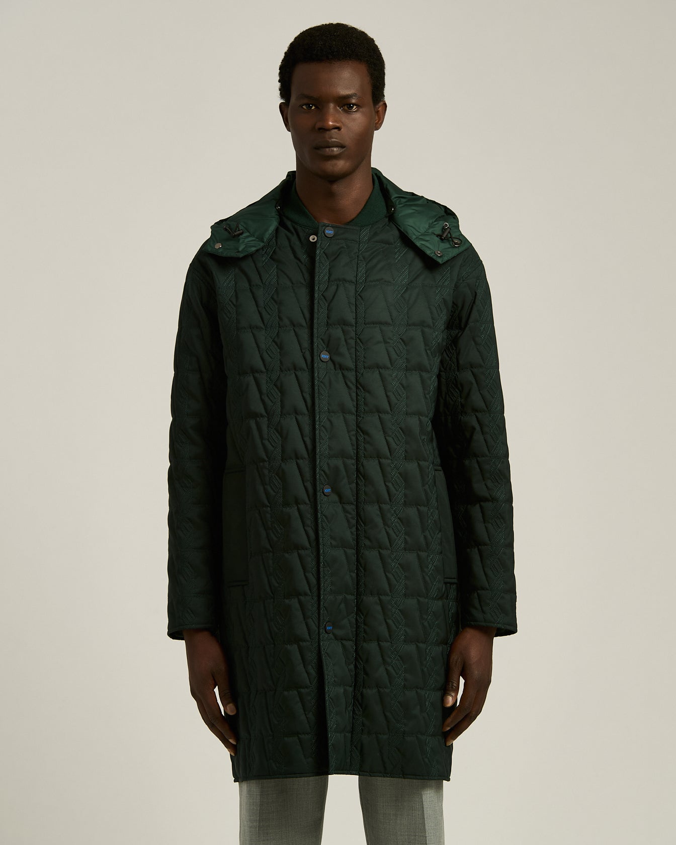 QUILTED TECHNICAL OVERCOAT WITH HOOD