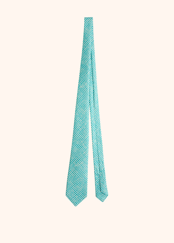 Kiton white polka dot design against an aqua green background tie for man, made of silk